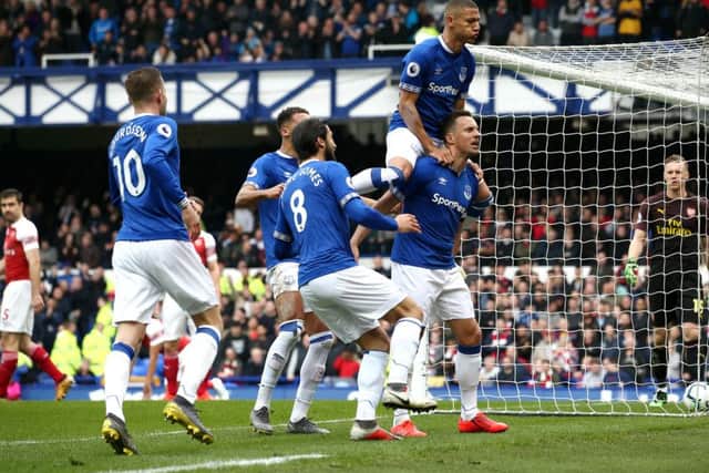 Everton's players celebrate a goal by Phil Jagielka against Arsenal. Picture: Getty Images