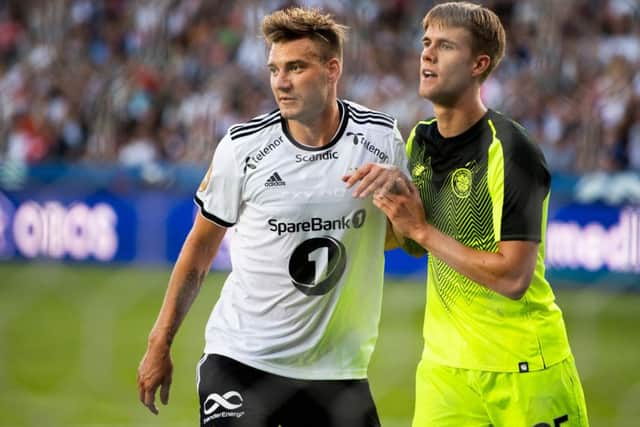 Kristoffer Ajer keeps an eye on Rosenborg's Nicklas Bendtner in the UEFA Champions League second qualifying round in August 2018. Picture: AFP/Getty Images