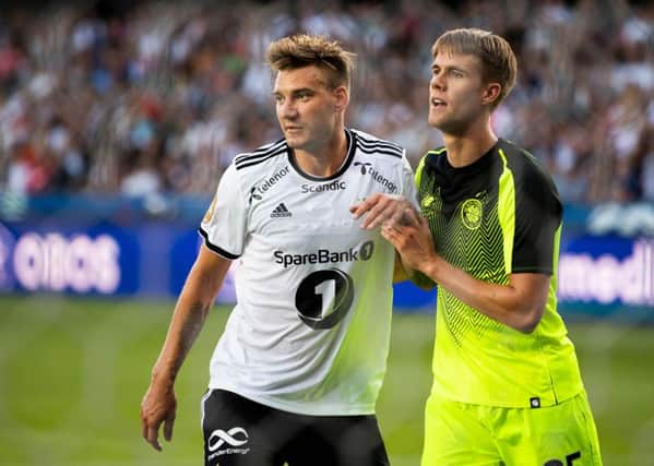 Kristoffer Ajer keeps an eye on Rosenborg's Nicklas Bendtner in the UEFA Champions League second qualifying round in August 2018. Picture: AFP/Getty Images