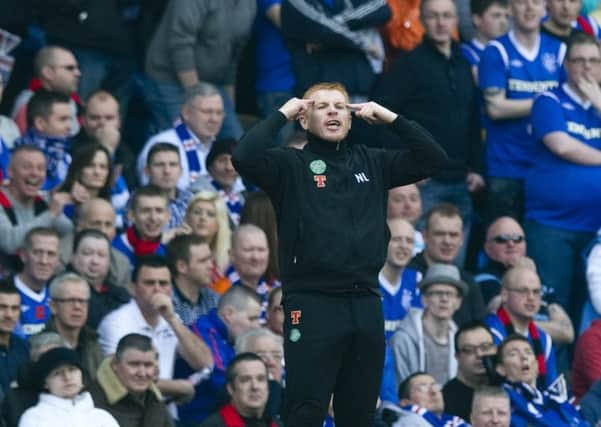 Neil Lennon on the touchline at Ibrox in March 2012, the last time he managed Celtic at the home of their arch rivals. Picture: SNS