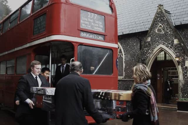 A scene from the film Dead Good shows a cardboard coffin being carried to a London Routemaster bus. Photograph: Ponder Productions