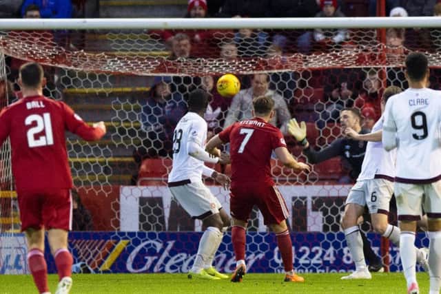 Greg Stewart's shot flies past Hearts goalkeeper Colin Doyle to secure Aberdeen's 2-1 victory at Pittodrie. Picture: Craig Foy/SNS