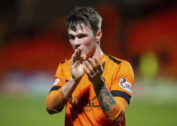 Dundee United's Jamie Robson. Pic: SNS/Ross MacDonald
