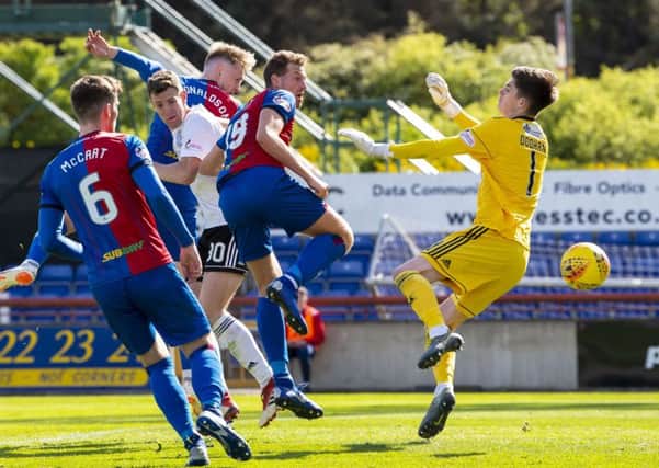 Inverness' Coll Donaldson heads home the equaliser. Pic: SNS/Ross Parker