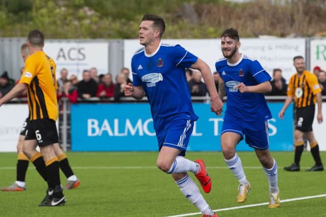 Jamie Masson celebrates making it 4-0 to Cove Rangers. Pic: SNS/Paul Devlin