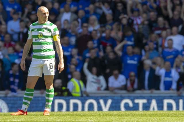 Scott Brown looks on as Rangers double their lead. Picture: SNS Group