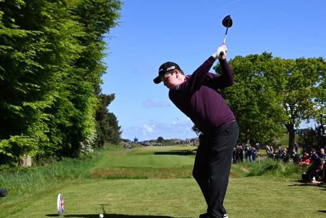 Bob Macintyre of Scotland tees off on the sixth hole at the British Masters.