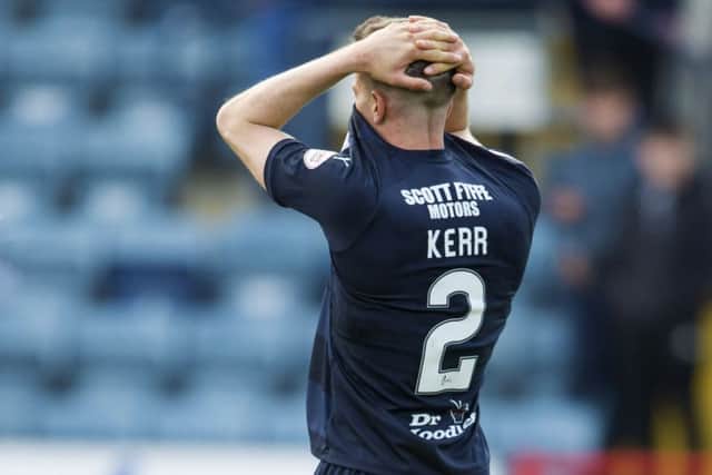 Cammy Kerrs tears came from a shattered dream. Now the boyhood Dundee fan may be allowed to dream again. Picture: SNS.