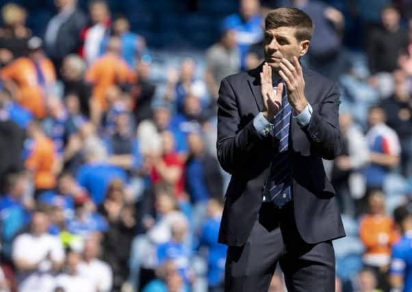 Steven Gerrard applauds the fans at full- time  after Rangers' 2-0 win over Celtic at Ibrox.