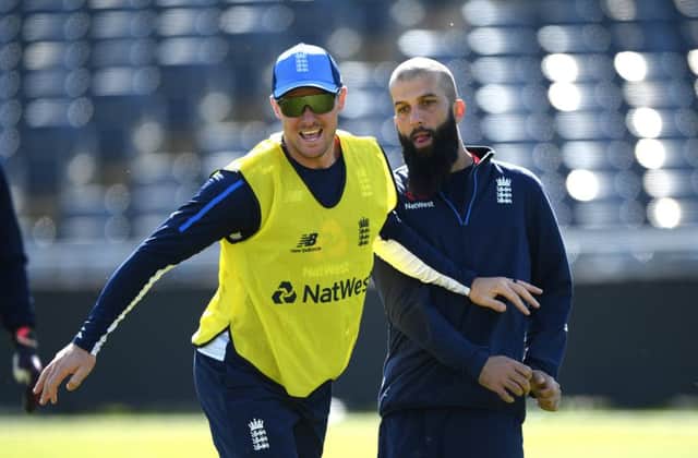 Jason Roy, left, shares a joke with England team-mate Moeen Ali ahead of the 3rd Royal London One Day International match against Pakistan in Bristol. Picture: Stu Forster/Getty