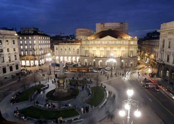Milan is home to some echoingly grand architecture (Picture: Luca Bruno/AP)