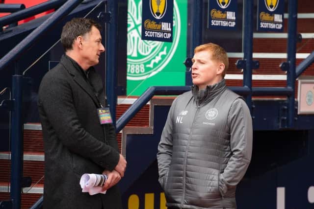 Chris Sutton speaking to Celtic boss Neil Lennon. Picture: SNS