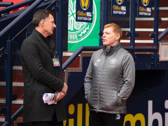 Chris Sutton speaking to Celtic boss Neil Lennon. Picture: SNS