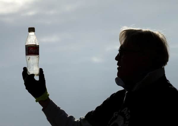A quarter of the plastic trash found during clean-ups on UK beaches last month was made by drinks giants Coca Cola and Pepsi - campaigners are calling for tougher action from big business to tackle the problem