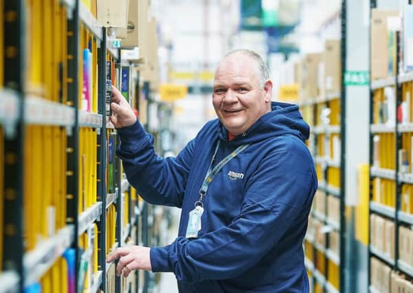 Scot McKeen, who has worked at Amazon in Dunfermline since 2010, qualified as a heavy goods vehicle driver this week. Picture: Fraser Band