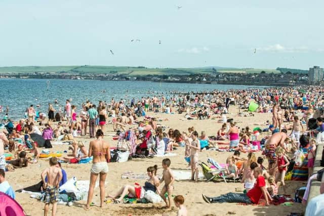 Edinburgh's Portobello beach is a common sunbathing spot during hot weather.