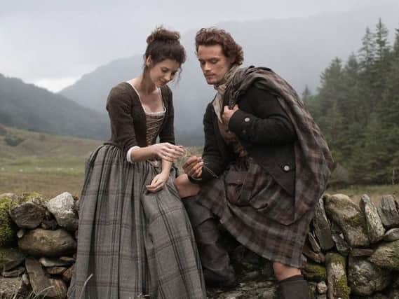 The romance between Jamie (Sam Heughan) and Claire (Catriona Balfe) is set against a stunning backdrop of gorgeous Scottish locations.