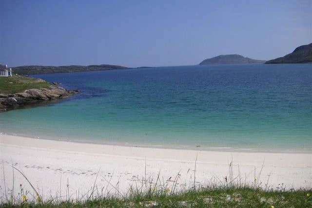 Vatersay is the southernmost inhabited island in the Outer Hebrides and the eastern bay is where we find this long and beautiful sandy beach.