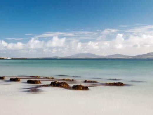 Ideal for walks and picnics, this white shell sand beach can be found near the most northerly point on the Isle Of Barra.