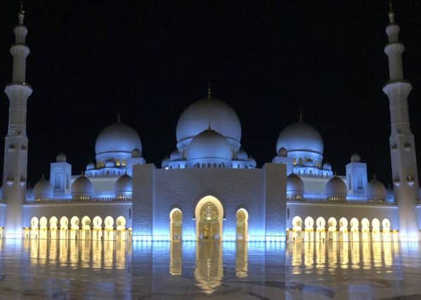 Sheikh Zayed Grand Mosque, where pools of water outside reflect illluminated columns after nightfall. Picture: Patrick McPartlin