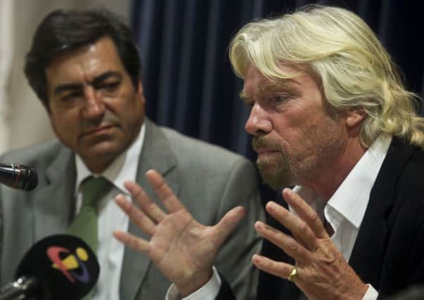 Joao Goulao with Sir Richard Branson, member of the Global Commission on Drug Policy, speaking at a conference in Lisbon. Picture: Miguel A Lopes/Rex/Shutterstock