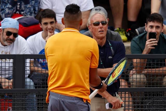Australia's Nick Kyrgios argues with tournament umpire Gerry Armstrong in Rome. Picture: Adam Pretty/Getty Images