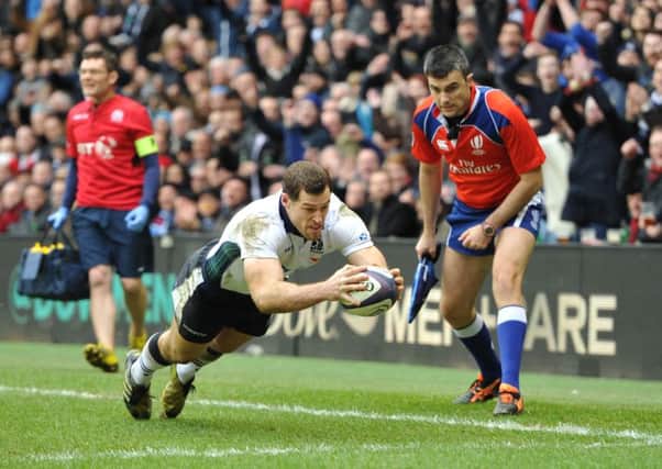 Tim Visser dives over to score for Scotland against France in 2016.  Picture Ian Rutherford