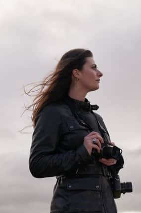 Photojournalist Emily Garthwaite has a work uniform for each climate. In the Middle East, it's jeans, linen shirt and hijab, for the Everyday Heroes Collection photographed in the Highlands, her Belstaff Trialmaster Triumph jacket