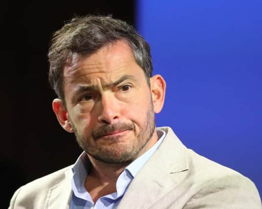 Editor John Witherow admitted that, in a satirical column by Giles Coren (pictured), a gag about people who were 'something in between' men and women, should have been cut. Picture: PA