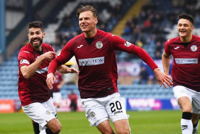 Cody Cooke celebrates after giving his side the lead. Picture: SNS