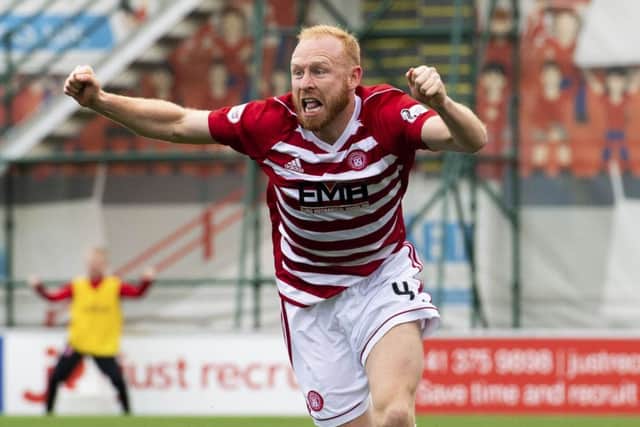 Ziggy Gordon wheels away in delight after making it 1-0 to Hamilton. Picture: SNS