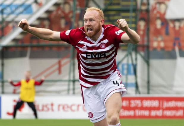 Ziggy Gordon wheels away in delight after making it 1-0 to Hamilton. Picture: SNS