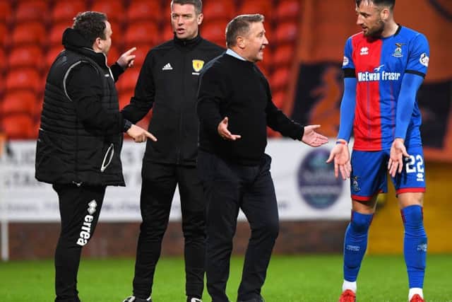 Inverness boss John robertson discusses the penalty incident with Brad McKay, while assistant manager Scott Kellacher speaks to fourth official David Lowe. Picture: Alan Harvey/SNS