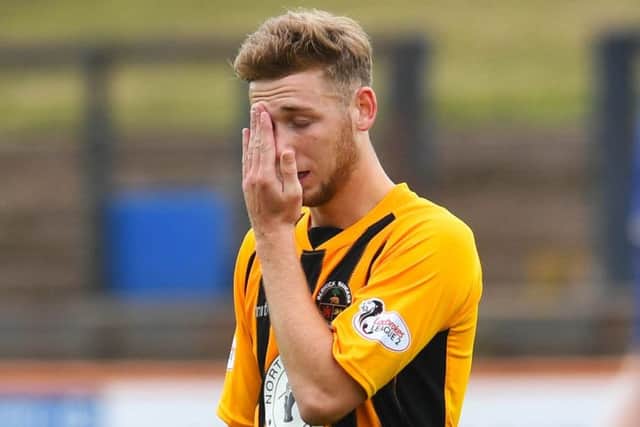 Dejection for 
Berwick's Jack Ogilvie is dejected after the first goal. Picture: SNS.