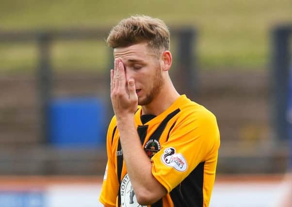 Dejection for 
Berwick's Jack Ogilvie is dejected after the first goal. Picture: SNS.