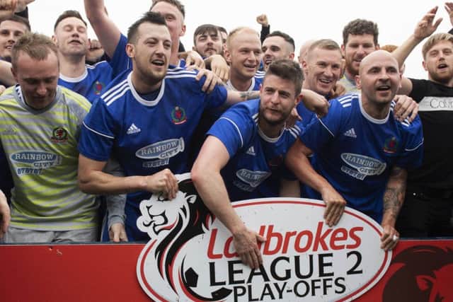 Cove Rangers' players celebrate having clinched promotion to the SPFL. Picture: SNS