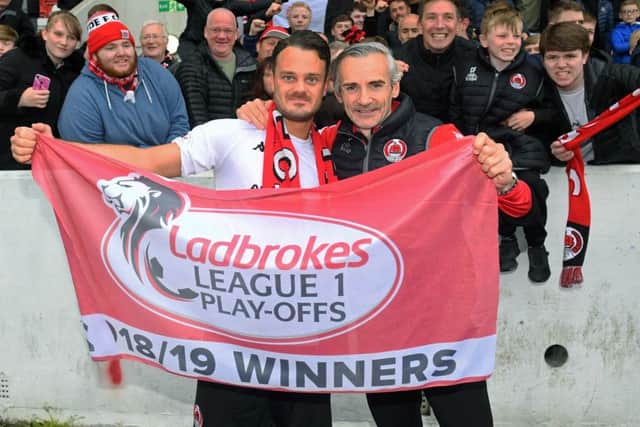 Match winner Ally Love (left) and manager Danny Lennon celebrate as Clyde are promoted to Ladbrokes League One. Picture: SNS