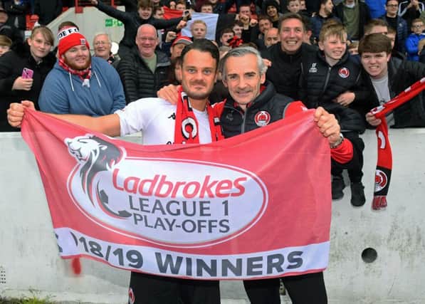 Match winner Ally Love (left) and manager Danny Lennon celebrate as Clyde are promoted to Ladbrokes League One. Picture: SNS