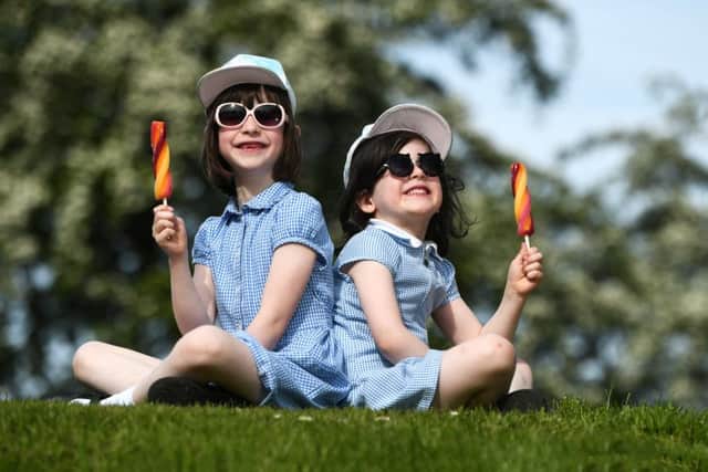 John Devlin 13/05/2019. GLASGOW. Weather pic. 


Children enjoy an ice lolly in Stonelaw Woods, Burnside.

Scotland's weather: Glasgow to be hotter than Ibiza this week.
Scotland will bask in glorious sunshine this week as temperatures soar to a balmy 22C in some parts of the country.

Glasgow in particular will enjoy weather warmer than the likes of Ibiza and Barcelona, with Wednesday predicted to be the hottest day of the week.

Edinburgh will also enjoy long spells of sunshine throughout the week, with temperatures reaching a high of 21C on Tuesday, although there will be light to moderate winds.

Craig Snell of the Met Office said:â¬If you are lucky enough to have the week off, Scotland is going to be warm and very sunny this week.

â¬SItâ¬"s a huge improvement on what we have had in May so far and will make places in England seem distinctly chilly.â¬

He added: "It is looking like a good chunk of Scotland will see temperatures increase day-on-day this week.

"The sunshine we are seeing today is what we