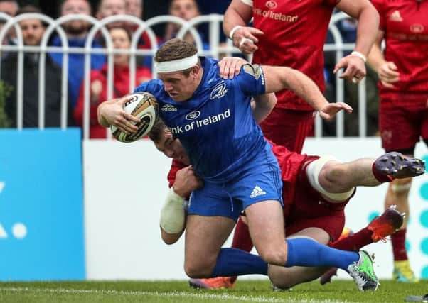 Leinster's Sean Cronin scores a try despite the attention of Munster's Peter O'Mahony.  Picture: Laszlo Geczo/INPHO/REX/Shutterstock