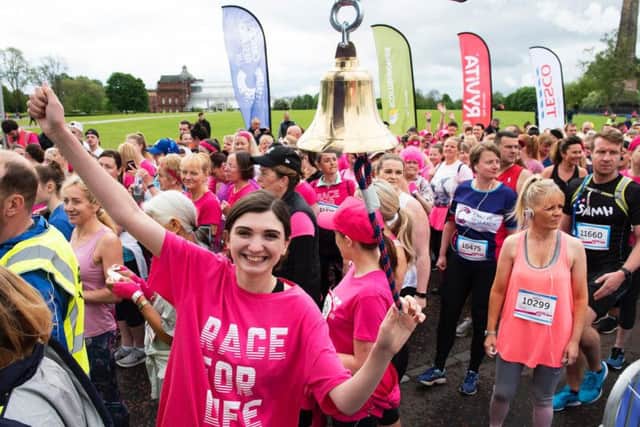 Sara Wilson rings the bell to begin the 25th Race for Life in Glasgow, with the city even raising around 20m since it began in 1995. Both Sara and her late father suffered from the disease. PIC: Contributed.