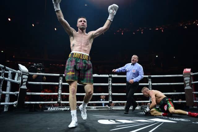 Josh Taylor reacts as he knocks down Ivan Baranchyk in the sixth round in Glasgow. Picture: Getty.