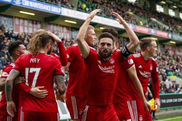 Aberdeen's Graeme Shinnie celebrates James Wilson's goal. Pic: SNS/Ross Parker