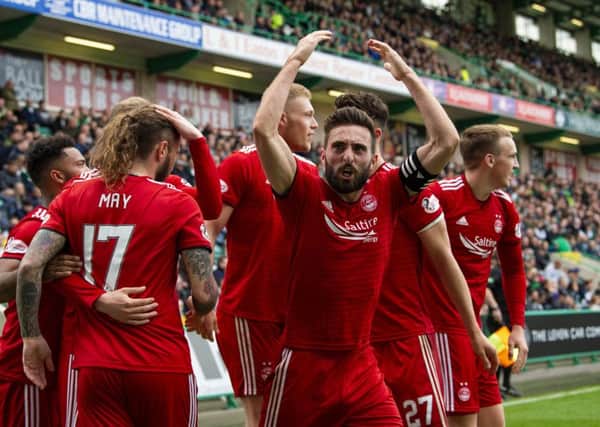 Aberdeen's Graeme Shinnie celebrates James Wilson's goal. Pic: SNS/Ross Parker
