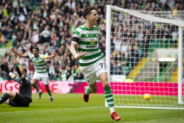 Celtic's Mikey Johnston celebrates his opening goal. Pic: SNS/Alan Harvey