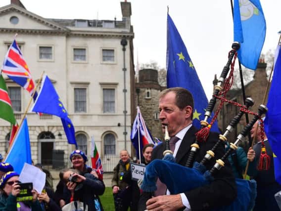 Alastair Campbell says playing the pipes has helped him deal with his depression. PIC: PA Wire/Victoria Jones.