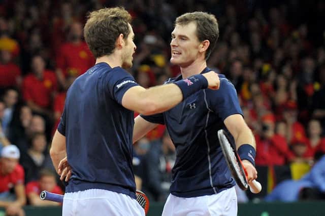 Andy and Jamie Murray playing together during the 2015 Davis Cup. Picture: Jane Barlow