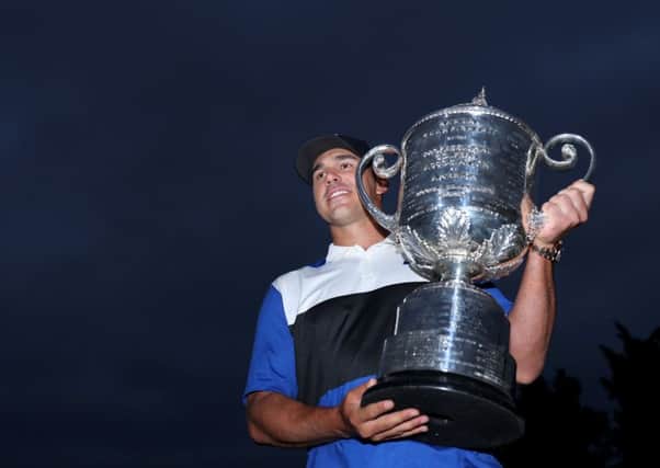 Brooks Koepka with the Wanamaker Trophy after defending his US PGA title. Picture: Warren Little/Getty Images