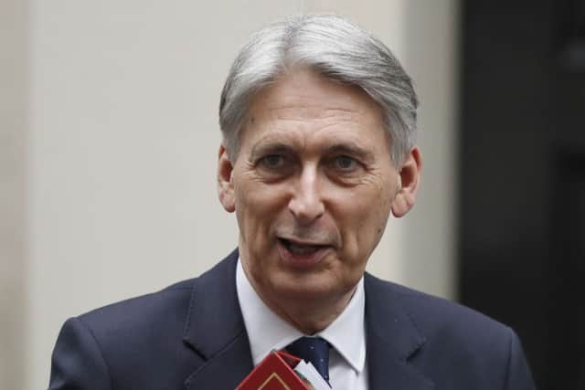Britain's Chancellor of the Exchequer Philip Hammond. Picture: AP Photo/Alastair Grant