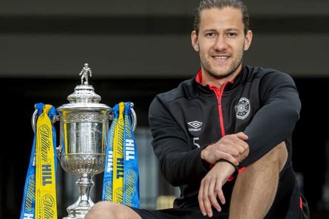 Hearts' Peter Haring with the William Hill Scottish Cup. Picture: Bill Murray/SNS